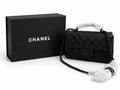 Chanel Classic Flap Bag - Black Quilted Leather