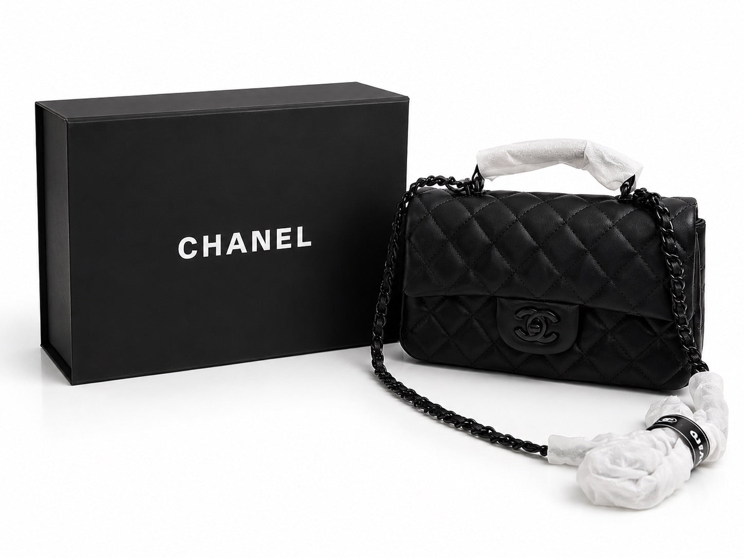 Chanel Classic Flap Bag - Black Quilted Leather