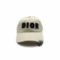 Dior Cream Distressed Curved Brim Cap With Black Logo Embroidery