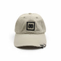 Balenciaga Beige Distressed Curved Brim Cap With BB Logo Patch